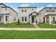 Charming two-story home with manicured lawn and inviting front porch, perfect for suburban living at 16460 Silver Brook Way, Winter Garden, FL 34787