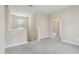 Cozy loft area with neutral carpeting and paint, perfect for a reading nook or play area at 16460 Silver Brook Way, Winter Garden, FL 34787