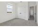Bedroom with double doors and large window at 16544 Silver Brook Way, Winter Garden, FL 34787