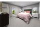 Inviting bedroom with plush carpeting, neutral walls, and elegant furnishings at 16544 Silver Brook Way, Winter Garden, FL 34787
