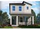 Charming two-story home featuring a covered front porch, neutral siding and clean, modern lines at 16544 Silver Brook Way, Winter Garden, FL 34787