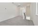 Neutral carpeted upstairs landing, featuring natural light at 16544 Silver Brook Way, Winter Garden, FL 34787
