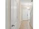 Inviting hallway with tile floors leading to a bright entryway at 1774 Peterson Pl, Sanford, FL 32773