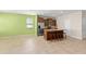 Kitchen and living space with island and stainless steel appliances at 1774 Peterson Pl, Sanford, FL 32773