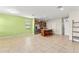 Spacious open layout with tile flooring, kitchen island and stainless steel refrigerator at 1774 Peterson Pl, Sanford, FL 32773
