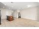 Open living space with tile floors, recessed lighting, and a kitchen island at 1774 Peterson Pl, Sanford, FL 32773
