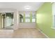 Bright living space with large windows and tile flooring at 1774 Peterson Pl, Sanford, FL 32773