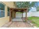 View of the outdoor patio with ceiling fan, concrete base and brick pavers at 1774 Peterson Pl, Sanford, FL 32773