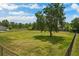 Expansive backyard with mature trees and full fencing at 19204 Paddock St, Orlando, FL 32833