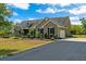 Lovely home with a manicured lawn, screened porch, and attached two-car garage in a quiet neighborhood at 19204 Paddock St, Orlando, FL 32833