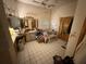Large bathroom with tile flooring, cabinets, shower and toilet area at 2120 Lakebreeze Way, Deltona, FL 32738