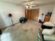 Bedroom features include a ceiling fan and closet at 2120 Lakebreeze Way, Deltona, FL 32738