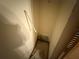 An interior view of a closet displaying some minor drywall damage and missing shelving at 2120 Lakebreeze Way, Deltona, FL 32738