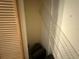 An interior shot of a closet showing missing shelving at 2120 Lakebreeze Way, Deltona, FL 32738