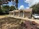 Charming single-story brick home featuring beautiful landscaping and well-maintained front yard, offering great curb appeal at 2120 Lakebreeze Way, Deltona, FL 32738