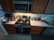 A well-equipped kitchen with modern stainless steel appliances and ample counter space at 2120 Lakebreeze Way, Deltona, FL 32738