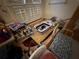 Laundry area with folding table, storage area, and window at 2120 Lakebreeze Way, Deltona, FL 32738