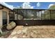 Exterior shot showing screened in pool and house at 2120 Lakebreeze Way, Deltona, FL 32738