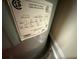 Close up of the electric water heater's specifications and manufacturer label at 2120 Lakebreeze Way, Deltona, FL 32738