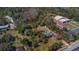Large parcel of land outlined in red with mature trees ready for new construction or redevelopment at 2214 Rouse Rd, Orlando, FL 32817