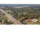 A calming aerial view of land, close to commercial establishments and neighborhood streets at 2214 Rouse Rd, Orlando, FL 32817
