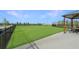 Community green space featuring picnic area and well manicured lawn at 2241 Mystic Maze Ln, Minneola, FL 34715