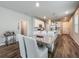 Open concept dining area and kitchen featuring modern furnishings and finishes at 2241 Mystic Maze Ln, Minneola, FL 34715