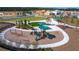 Aerial view of a community playground highlighting play structures and picnic areas in a Gathering-friendly environment at 2241 Mystic Maze Ln, Minneola, FL 34715