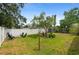 A large fenced backyard creates a private and spacious outdoor living area at 2415 S Oak Ave, Sanford, FL 32771