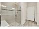 Modern bathroom featuring a glass-enclosed shower with a built-in bench and stylish tile accents at 2458 Cliff Way, St Cloud, FL 34771