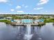 Stunning community pool with a fountain and palm trees, perfect for relaxation and leisure at 2458 Cliff Way, St Cloud, FL 34771