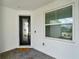 The front porch features a decorative glass front door and a window with privacy blinds at 2458 Cliff Way, St Cloud, FL 34771