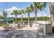 Beautiful outdoor kitchen with a grill, prep area, and seating, ideal for entertaining guests at 2458 Cliff Way, St Cloud, FL 34771