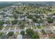 High-angle view of residential area with a golf course in the background at 2755 Abbey Ave, Orlando, FL 32833