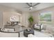 Airy living room featuring a neutral color scheme, modern furniture, and seamless flow to the dining area at 2755 Abbey Ave, Orlando, FL 32833