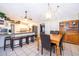 Kitchen and dining room area, with breakfast bar and pendant lighting at 3049 Condel Drive, Orlando, FL 32812