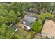 Aerial view showcasing the roof, backyard, detached garage, and mature trees creating a private oasis at 40 W Smith St, Winter Garden, FL 34787
