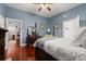 Bedroom with hardwood floors, and antique furnishings in a home for sale at 40 W Smith St, Winter Garden, FL 34787