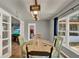 Charming dining area boasting great lighting and access to the living room and backyard at 474 Overstreet Ave, Longwood, FL 32750