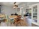 Inviting dining room showcasing an open layout with a view of the living room at 474 Overstreet Ave, Longwood, FL 32750