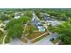 Aerial view of property featuring a pool, fenced backyard and mature trees at 4804 Oakbrooke Pl, Orlando, FL 32812