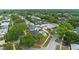 Aerial view of property showcasing its pool, privacy fence, and landscaping at 4804 Oakbrooke Pl, Orlando, FL 32812