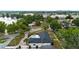 Aerial shot of backyard oasis with a kidney-shaped pool, offering a private and tranquil setting at 4804 Oakbrooke Pl, Orlando, FL 32812