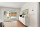Bright sunroom with a sliding glass door looking out on the pool and patio at 4804 Oakbrooke Pl, Orlando, FL 32812