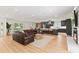 Open-concept living area showcasing modern kitchen, spacious design, and seamless flow at 4804 Oakbrooke Pl, Orlando, FL 32812