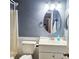 Classic bathroom featuring a single vanity and toilet with a shower and tub at 5005 Mill Stream Rd, Ocoee, FL 34761