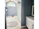 Tasteful bathroom with a modern vanity, framed mirror, tiled floors, and a large tub at 5005 Mill Stream Rd, Ocoee, FL 34761