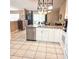 Lovely kitchen boasting granite countertops, stainless steel appliances, and white cabinetry at 5005 Mill Stream Rd, Ocoee, FL 34761