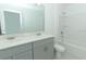 Modern bathroom featuring a double sink vanity and a shower/tub combination at 5153 Forget Me Not Ave, Lake Hamilton, FL 33851