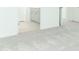 Comfortable bedroom featuring plush carpet and an ensuite bathroom with modern finishes at 5153 Forget Me Not Ave, Lake Hamilton, FL 33851